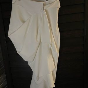 White Asymmetrical skirt with faux leather waistband and D-Ring belt.